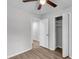 Bedroom features wood-look flooring, ceiling fan, and a closet at 108 Wadmalaw Cir, Summerville, SC 29483