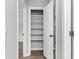 Hallway with views to rooms featuring laminate floors with open closet and new paint at 108 Wadmalaw Cir, Summerville, SC 29483