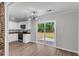 Open kitchen and dining area featuring modern appliances and sliding glass doors offering a view of the backyard at 108 Wadmalaw Cir, Summerville, SC 29483