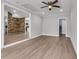 Spacious living room with wood-look flooring leads to the kitchen at 108 Wadmalaw Cir, Summerville, SC 29483