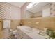 Bathroom featuring floral wallpaper and vanity at 110 Jackson Rd, Ladson, SC 29456