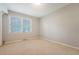 Bright bedroom with neutral walls, carpet, and a large window at 110 Jackson Rd, Ladson, SC 29456