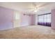 Cozy bedroom with ample natural light and a ceiling fan for added comfort and style at 110 Jackson Rd, Ladson, SC 29456