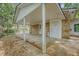 This house has a covered carport with a large concrete pad and an attached storage area at 110 Jackson Rd, Ladson, SC 29456