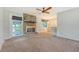 Inviting living room featuring a brick fireplace and a ceiling fan, perfect for relaxing at 110 Jackson Rd, Ladson, SC 29456