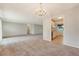 Open living room featuring great lighting that flows into the kitchen, creating a welcoming space at 110 Jackson Rd, Ladson, SC 29456
