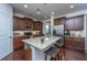 Spacious kitchen featuring stainless steel appliances, granite counters and a large kitchen island with barstool seating at 1146 Moss Grove Dr, Moncks Corner, SC 29461