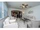 Open-concept living room flowing into the kitchen, perfect for entertaining guests at 1146 Moss Grove Dr, Moncks Corner, SC 29461