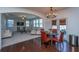 Inviting living room featuring an open floor plan with hardwood and carpet flooring and neutral paint colors at 1146 Moss Grove Dr, Moncks Corner, SC 29461