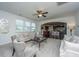 Open-concept living room flowing into the kitchen, perfect for entertaining guests at 1146 Moss Grove Dr, Moncks Corner, SC 29461