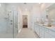 Bathroom featuring a frameless glass shower, double vanity, and stylish tile flooring at 1149 Darling St, Summerville, SC 29485