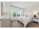 Bright bedroom with natural light, wood floors, and decorative wallpaper creates a serene and inviting space at 1149 Darling St, Summerville, SC 29485