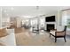 Bright open-concept living room with modern fireplace, and neutral tones provides an inviting and relaxing atmosphere at 1149 Darling St, Summerville, SC 29485