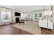 Bright living room with a fireplace, modern decor, and a comfortable seating area at 1149 Darling St, Summerville, SC 29485