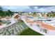 Resort-style community pool with orange umbrellas and lounge chairs, perfect for relaxation at 1149 Darling St, Summerville, SC 29485
