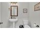 Modern half bathroom with pedestal sink, updated fixtures, and toilet at 116 Backhurst Dr, Summerville, SC 29486