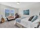 Cozy bedroom with natural light, decorative furniture, and guitar accents at 116 Backhurst Dr, Summerville, SC 29486
