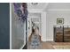 Welcoming entryway with hardwood floors, stylish decor, and ample natural light at 116 Backhurst Dr, Summerville, SC 29486