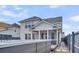Exterior view of home with a screened porch and backyard swim spa at 116 Backhurst Dr, Summerville, SC 29486