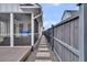 Exterior view of home with a screened porch, hot tub, and a stone pathway at 116 Backhurst Dr, Summerville, SC 29486