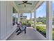 Cozy front porch with comfortable seating and view of a friendly neighborhood at 116 Backhurst Dr, Summerville, SC 29486