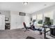 Well-equipped home gym area with a weight machine, exercise bike, and free weights at 116 Backhurst Dr, Summerville, SC 29486