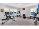 Spacious home gym equipped with exercise machines, weights, and a workout bench at 116 Backhurst Dr, Summerville, SC 29486