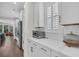 Bright kitchen with stainless steel appliances, white cabinets, and a cozy breakfast nook at 116 Backhurst Dr, Summerville, SC 29486