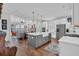Bright kitchen featuring a large center island with a farmhouse sink and stainless steel appliances at 116 Backhurst Dr, Summerville, SC 29486