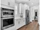 Bright kitchen featuring stainless steel appliances, white cabinets, and a built in microwave and oven at 116 Backhurst Dr, Summerville, SC 29486