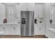 Bright kitchen featuring stainless steel appliances, white cabinets and subway tile backsplash at 116 Backhurst Dr, Summerville, SC 29486