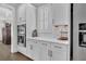 Bright kitchen featuring stainless steel appliances, white cabinets and subway tile backsplash at 116 Backhurst Dr, Summerville, SC 29486