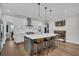Modern kitchen with a large island, stainless steel appliances, and stylish pendant lighting at 116 Backhurst Dr, Summerville, SC 29486
