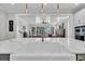 Bright kitchen featuring a large center island with a farmhouse sink and pendant lighting at 116 Backhurst Dr, Summerville, SC 29486