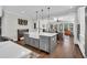Bright kitchen featuring a large center island with a farmhouse sink and stainless steel appliances at 116 Backhurst Dr, Summerville, SC 29486