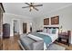 Spacious main bedroom with hardwood floors, a ceiling fan, and ensuite bathroom at 116 Backhurst Dr, Summerville, SC 29486