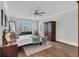 Spacious main bedroom featuring a ceiling fan and large windows with shutter-style blinds at 116 Backhurst Dr, Summerville, SC 29486