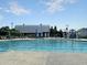 Community pool area includes a splash fountain, covered area, and green space for Gathering enjoyment at 116 Backhurst Dr, Summerville, SC 29486