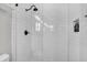 White subway tile shower with matte black hardware and a built-in soap niche at 116 Backhurst Dr, Summerville, SC 29486
