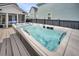 Backyard swim spa on a wooden deck, perfect for relaxation and exercise at 116 Backhurst Dr, Summerville, SC 29486