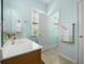 Bathroom featuring a white sink, wood-look vanity, and bright paint color at 117 Blue Bonnet St, Summerville, SC 29483