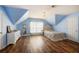 Spacious bedroom featuring vaulted ceilings, wood laminate floors, and a large window for natural light at 117 Blue Bonnet St, Summerville, SC 29483