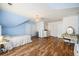 Large bedroom featuring wood laminate floors, ensuite, lots of storage, and a pendant chandelier at 117 Blue Bonnet St, Summerville, SC 29483