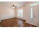 Inviting entryway featuring stylish wood floors, white wainscoting, and a bright front door at 117 Blue Bonnet St, Summerville, SC 29483