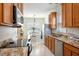 Eat-in kitchen with stainless appliances, granite counters, and a bright dining area at 117 Blue Bonnet St, Summerville, SC 29483