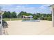 Community wading pool for small children with shade umbrellas and seating areas at 117 Blue Bonnet St, Summerville, SC 29483