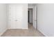 Bedroom featuring neutral carpet and double-door closet at 119 Summer Tanager Dr, Ravenel, SC 29470