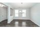 Dining room with wood floors, light walls, and natural lighting at 119 Summer Tanager Dr, Ravenel, SC 29470