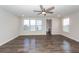 Inviting living room features hardwood floors, recessed lighting, and ample natural light at 119 Summer Tanager Dr, Ravenel, SC 29470