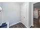 Practical mudroom area with a bench and hooks for organization near the entryway at 119 Summer Tanager Dr, Ravenel, SC 29470